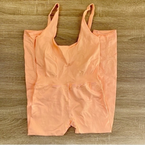 New Free People FP Movement Good Karma Onesie Jumpsuit in Morning Orange M/L - Picture 4 of 10